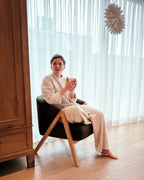 Armchair DORANO Boucle Dark Green – side view